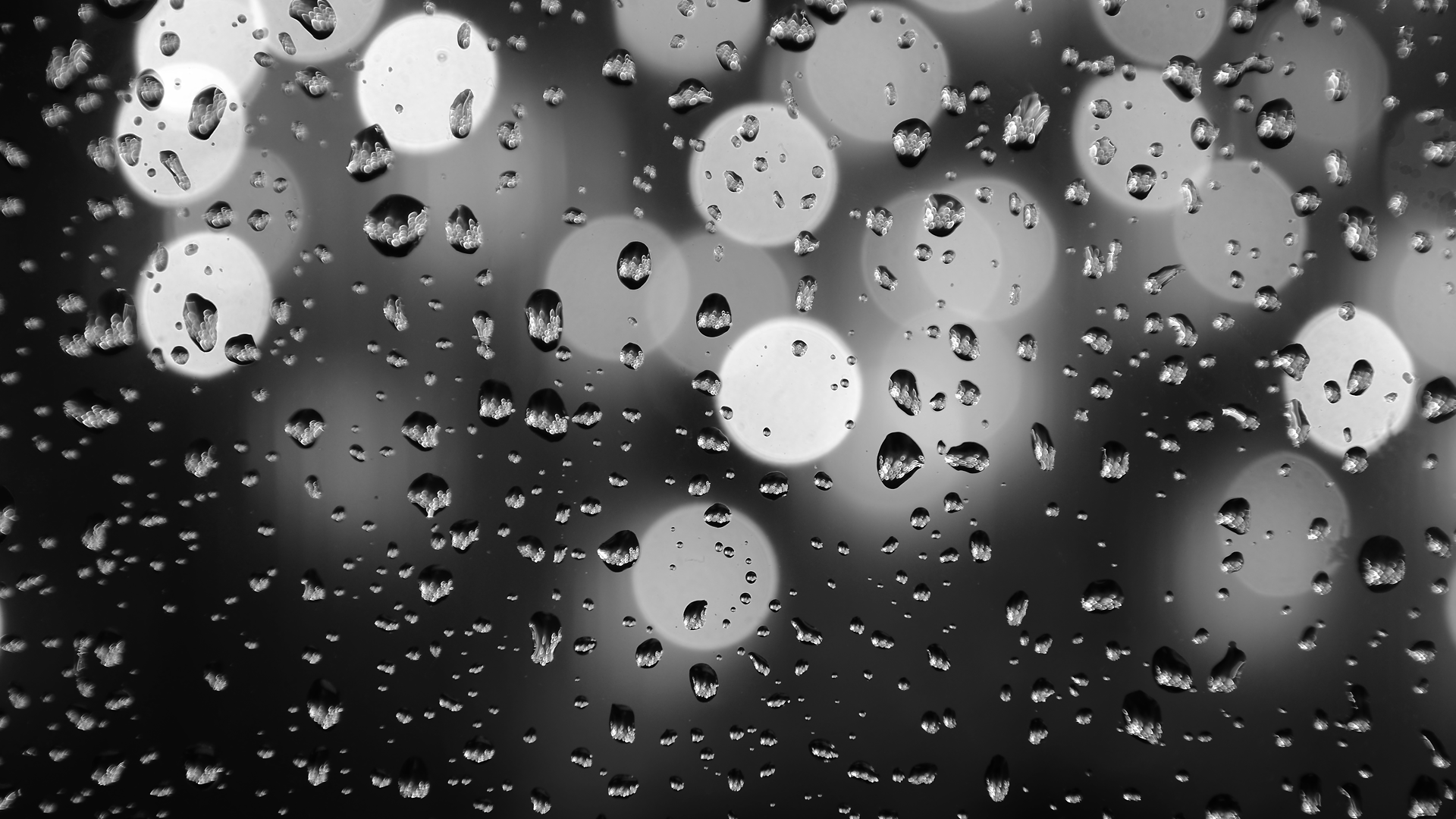 black-and-white-rain-on-window.png